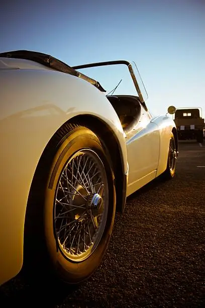 Photo of Close-up angled view of older style convertible