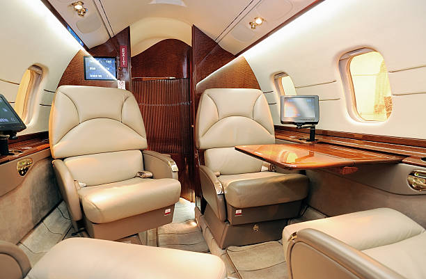 business jet-innenfutter - firmenflugzeug stock-fotos und bilder