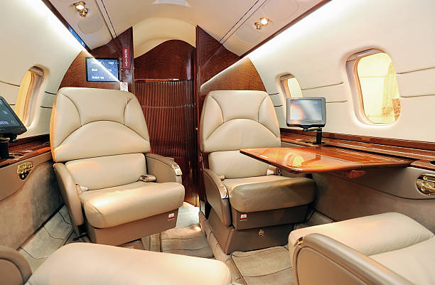 jet interni aziendale - vehicle interior corporate jet jet private airplane foto e immagini stock