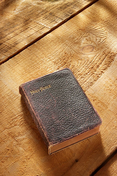 istock Antique Holy Bible on Old Wood 146739747