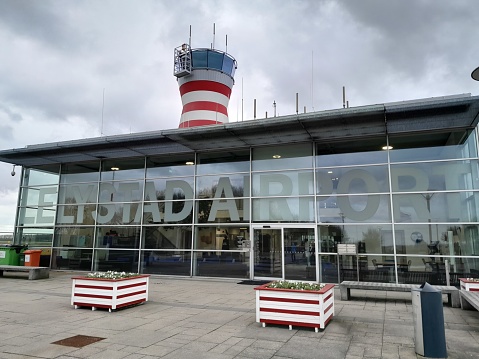 Lelystad airfield with control tower and cloudy sky, february 2023, province Flevoland, noordoostpolder, Holland