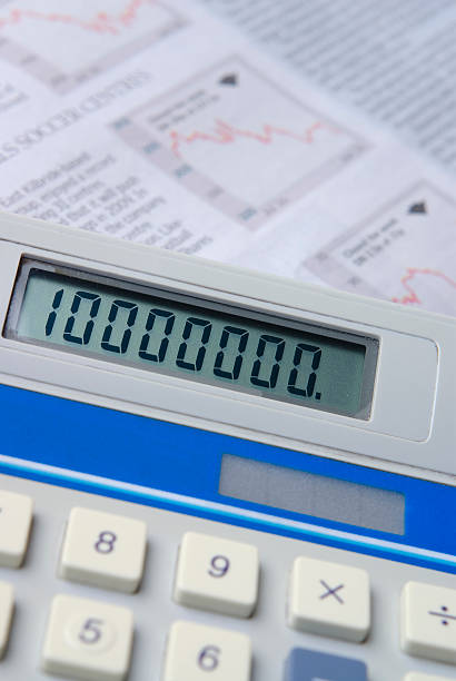 istock Calculator with financial newspaper 146739970