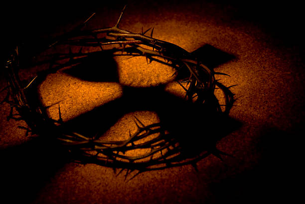 istock crown of thorns with crucifix shadow 146740123