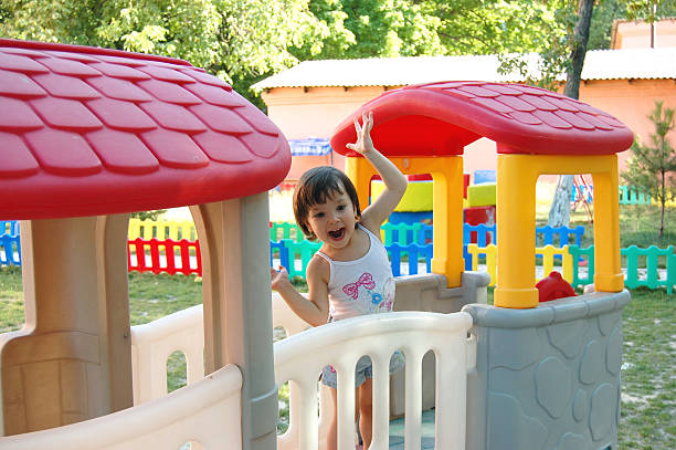 Happy Girl in Children's Village with lucky smile