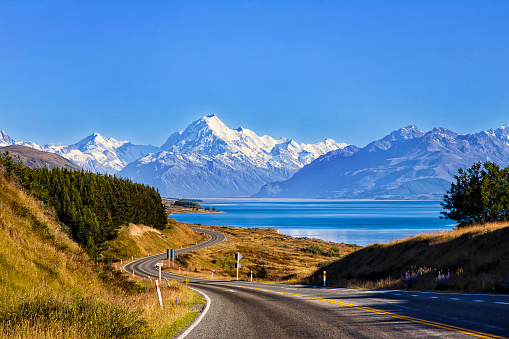 Turns of Highway 80 along Pukaki lake in Tasman valley to Mt Cook aoraki, New Zealand.