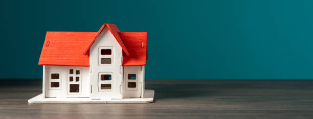 istock Model of house on the table 1467416490