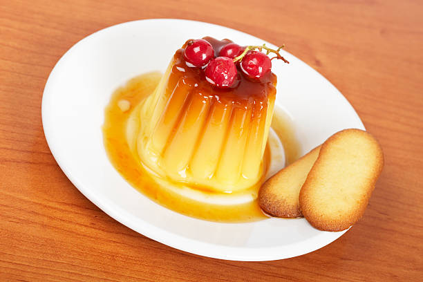 istock Cream caramel dessert with red currants and cookies 146741651