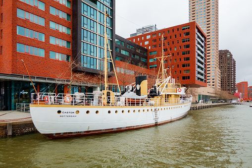 The former Dutch navy vessel A810 Castor is permanently moored in the Rijnhaven (Rhine Harbor) next to the Kop van Zuid quarter in Rotterdam.