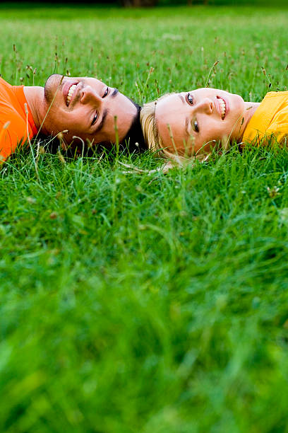 istock Couple Lying on the Grass 146741925