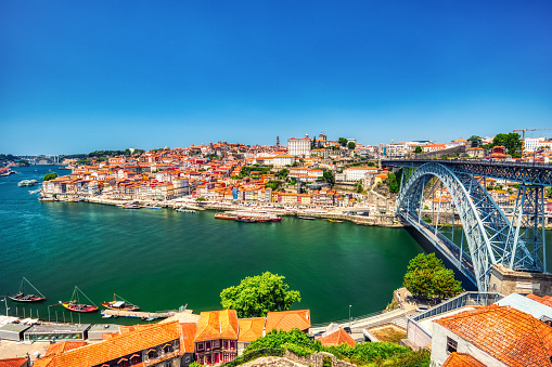 Porto Aerial Cityscape with Luis I Bridge and Douro River during a Sunny Day, Portugal