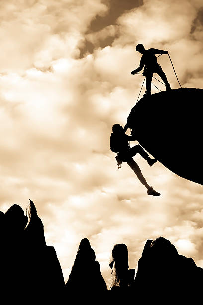 istock Team of climbers reaching the summit. 146742166