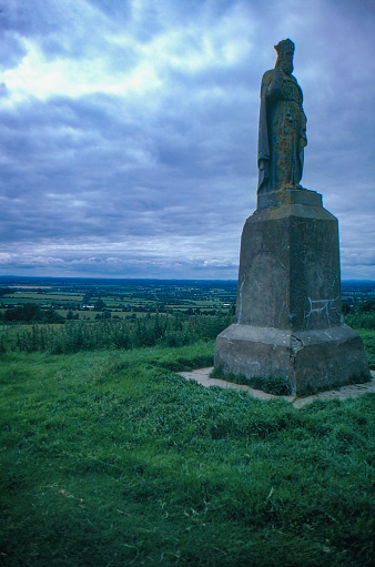 County Meath, Ireland - July 8, 1986: 1980s old Positive Film scanned, St Patrick Statue, Hill of Tara, County Meath, Ireland.