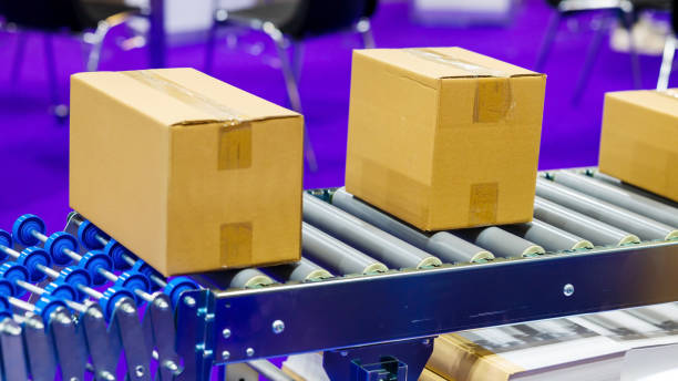 istock Brown Boxes On Conveyor Belt. The Concept Of Industrial Technologies And Packaging Materials. High quality photo 1467422052