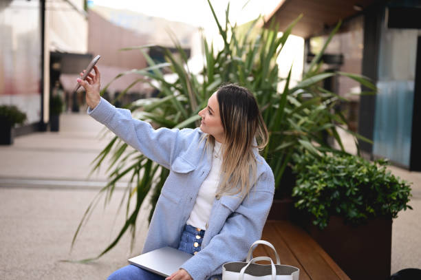 istock Successful female using smartphone to interact with her friends. 1467423627