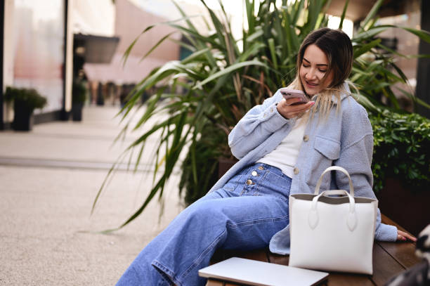 istock woman relaxing with her telephone. 1467423664