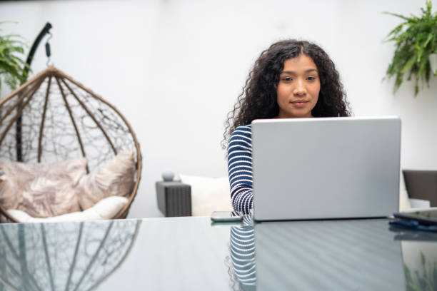 istock Woman is using her laptop to do internet shopping 1467425785