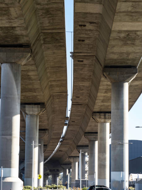 underneath concrete bridge - melbourne cityscape clear sky day imagens e fotografias de stock