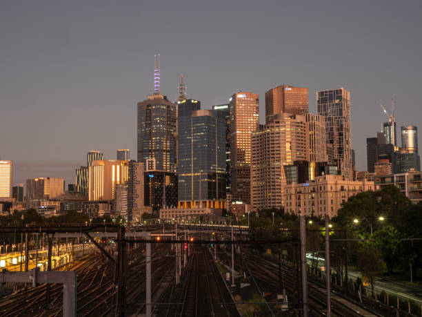 istock City skyline and train tracks at sunrise 1467426496