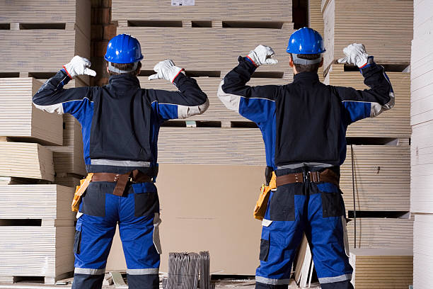 Two successful construction workers stock photo