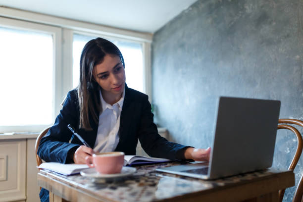 istock Working At Coffee Shop Remotely 1467428338