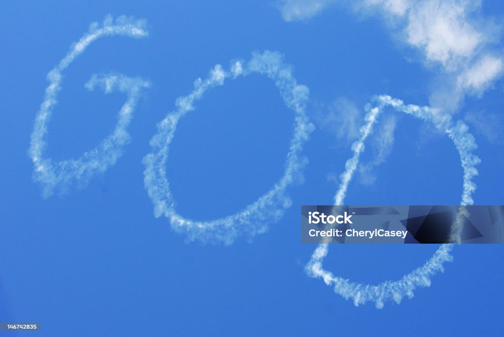 Skywritten God The word GOD in sky from skywriting Blue Stock Photo