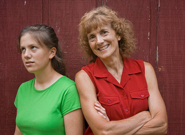 Mother and Daughter Mothers are always right, much to their children's chagrin. rolling eyes irritation displeased facial expression stock pictures, royalty-free photos & images