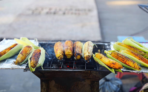 istock A Grilled corn street vendor. 1467433719