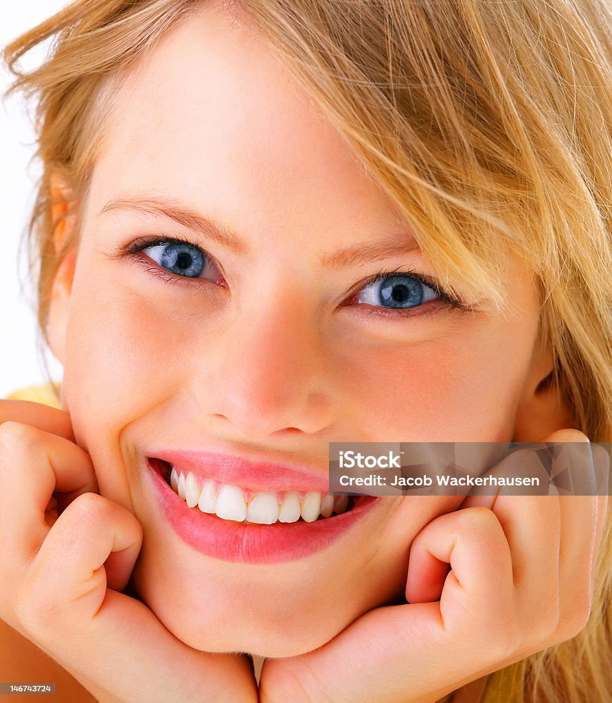 Close-up of a young woman smiling 20-24 Years Stock Photo