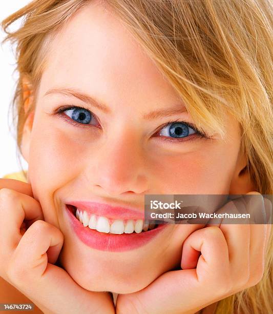 Closeup Of A Young Woman Smiling Stock Photo - Download Image Now - 20-24 Years, 20-29 Years, Adult