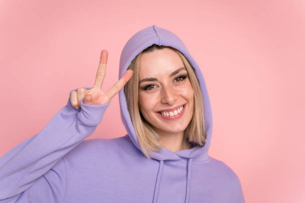 istock Excited hipster showing victory sign 1467438182