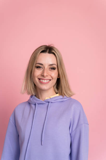istock Cheerful woman showing OK gesture 1467440348