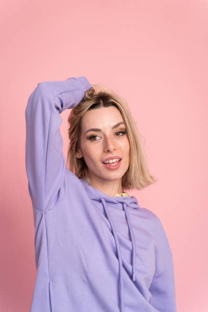 istock Cheerful woman showing OK gesture 1467440427