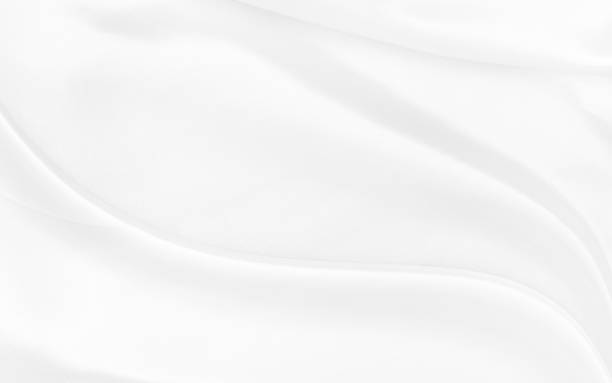 istock White gray satin texture that is white silver fabric silk background with beautiful soft blur pattern natural. 1467445064