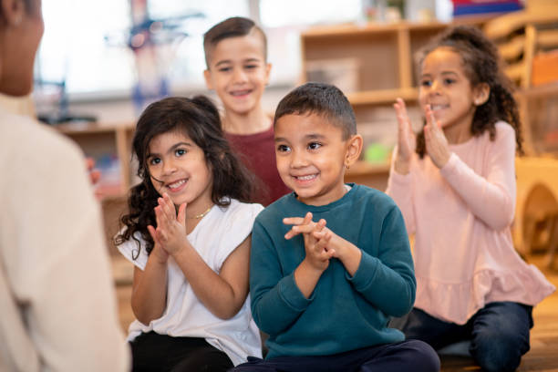 Kids clapping at daycare