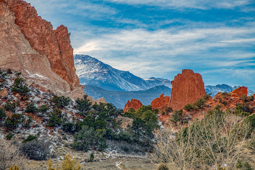 Garden of the Gods entrance with tall sandstone formations and Pikes Peak summit in Colorado Springs, Colorado, in western USA, of North America
