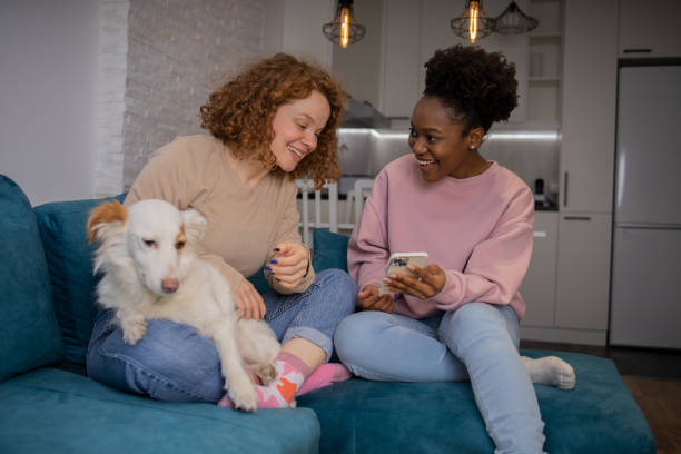 istock Happy two friends are spending time together at home. 1467449806