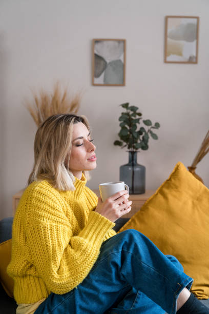 istock Young woman with cup of coffee 1467450109