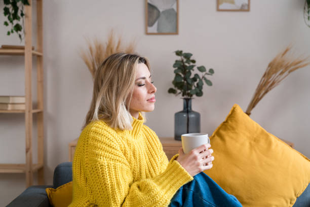 istock Young woman with cup of coffee 1467450159