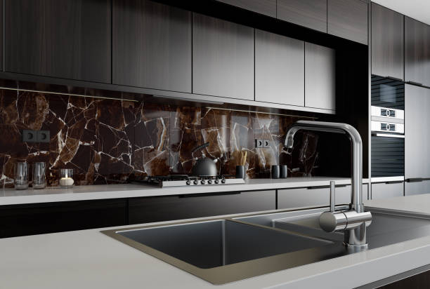 istock Modern minimalist kitchen with long island. Backsplash in focus. 1467450196