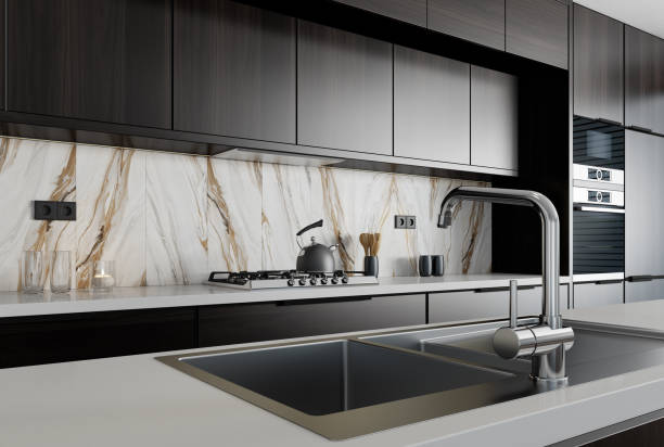 istock Modern minimalist kitchen with long island. Backsplash in focus. 1467450203