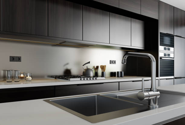 istock Modern minimalist kitchen with long island. Backsplash in focus. 1467450221