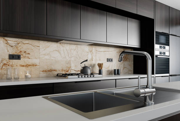 istock Modern minimalist kitchen with long island. Backsplash in focus. 1467450267