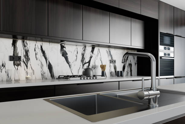 istock Modern minimalist kitchen with long island. Backsplash in focus. 1467450276