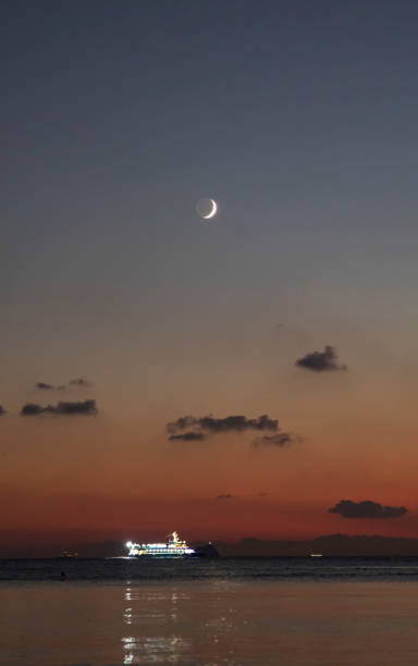 istock Crescent at sunset over the sea 1467451770