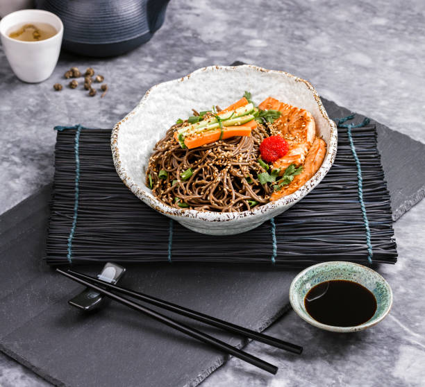 istock Noodles prepared with chicken, vegetables and soy sauce 1467453856