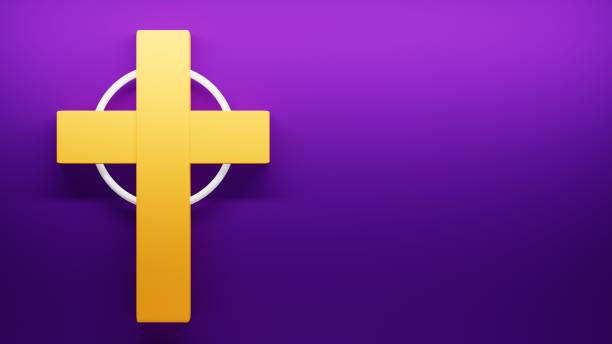 istock yellow cross on purple scenery, religious symbolism 1467458102