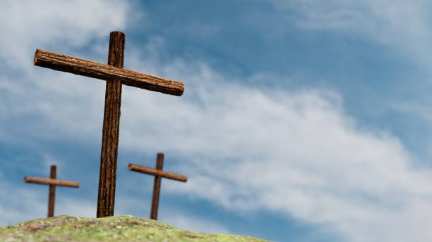 istock 3 wooden crosses on earth, sky with clouds, religious symbolism 1467458111
