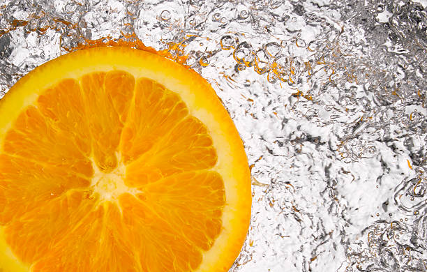 Scheibe Orange im Wasser – Foto