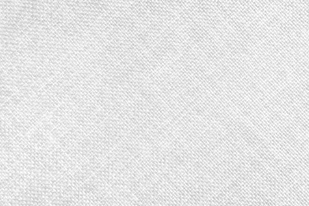 istock Jacquard woven upholstery, white coarse fabric texture with diagonal weave lines, close up 1467460748