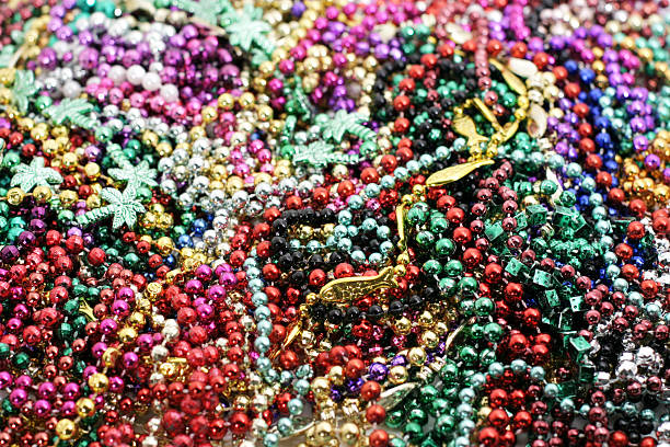 istock pile of mardi gras beads 146746162